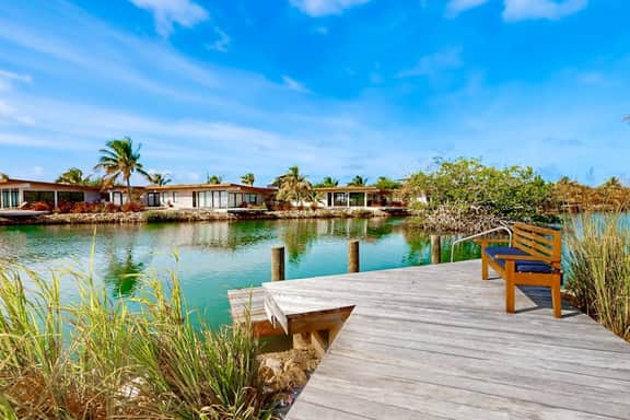 Relaxing lagoonfront villa with private pool, dock, cafe & on-site spa