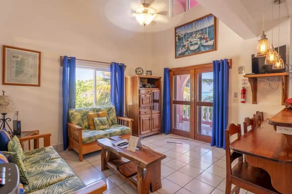 Breezy 2-story oceanfront condo with pool, sea views & partial AC - Image 2