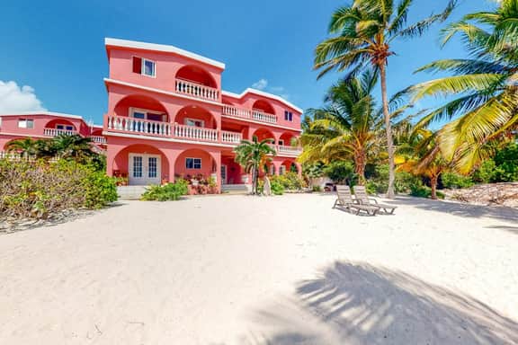 Romantic beachfront getaway with ocean views, pool, WiFi & partial AC