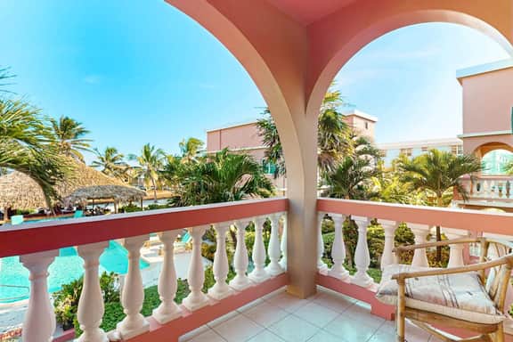 Ocean-view condo with pool, immediate beach access & partial AC