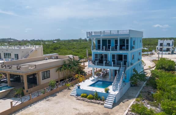 Amazing 2 story oceanfront house with pool, balcony, central AC, & WD