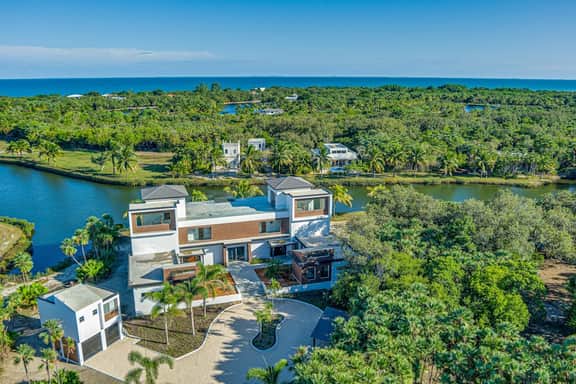 Spacious villa retreat with private pool, rooftop deck, kayaks, and pet-friendly perks