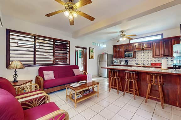 Garden-view condo steps to the beach with pool, dock & AC - snowbird-friendly