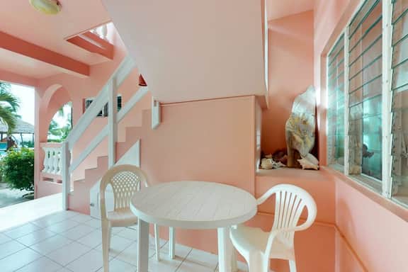 Ocean-view apartment in a beachfront resort with shared pool, WiFi & partial AC