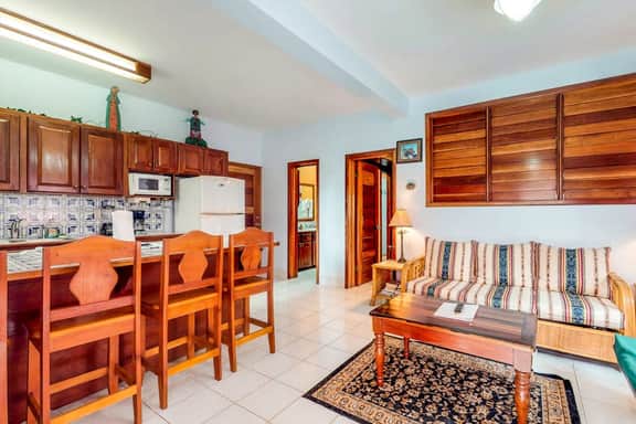 Ocean-view apartment in a beachfront resort with shared pool, WiFi & partial AC