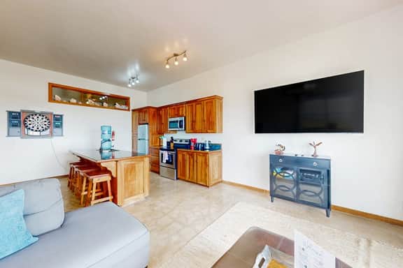 Tranquil apartment with modern amenities, and serene outdoor pool - Image 4