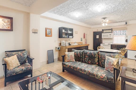 Homey suite in town w WiFi, partial AC, shared pool & veranda - walk to beach
