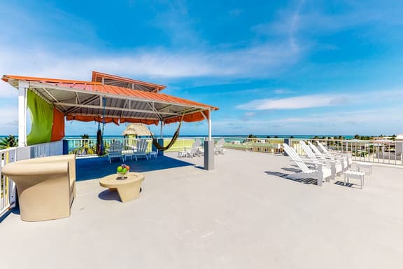 Inviting apartment w ocean views, a shared rooftop, laundry, WiFi & partial AC