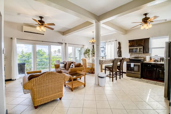 Colorful ocean-view suite with pool & concierge - near dining & town