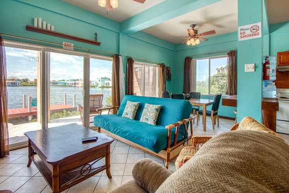Fantastic lagoon-front condo W free WiFi, full kitchen, dock, & great location