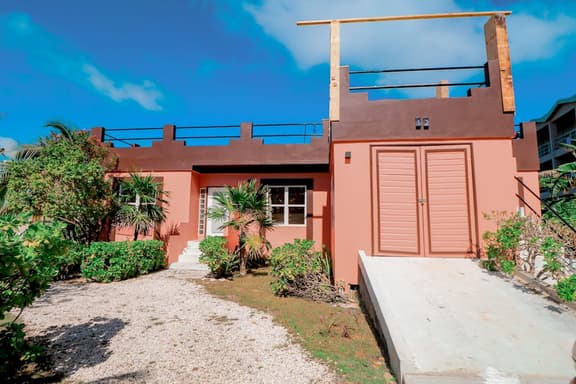 Beautiful lake-view villa with balcony, pool, & partial AC - near dining & shops