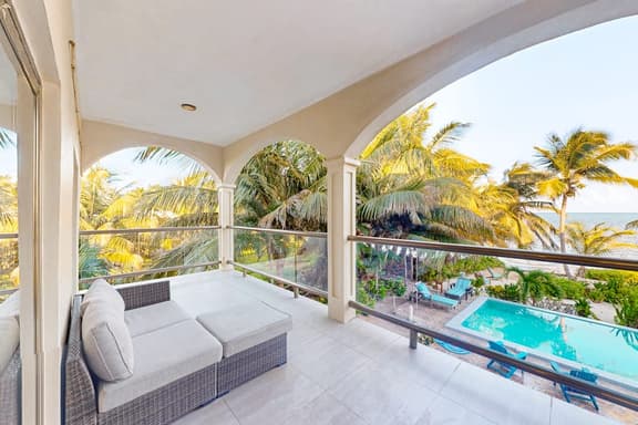 Relaxing condo with shared pool, ocean views, partial AC & WiFi