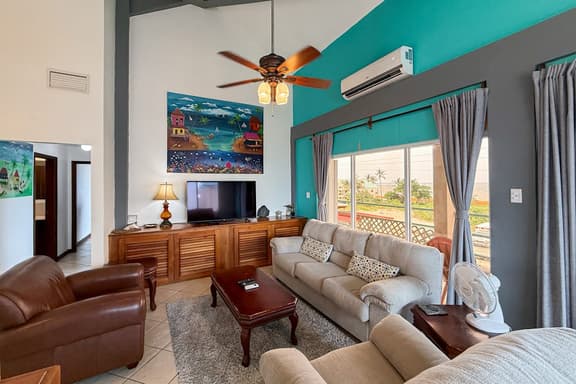 Ocean-view home with balcony, swimming pool & central AC