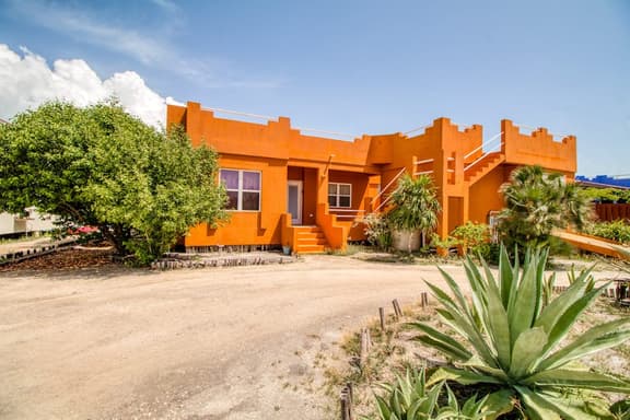 Waterfront resort villa with water views, balcony, full kitchen, & washer dryer