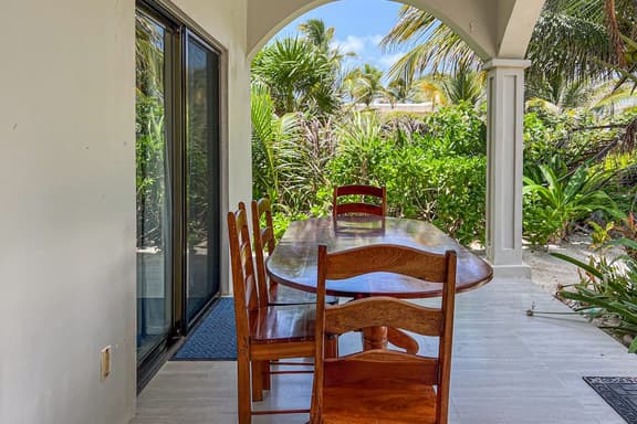 Colorful oceanfront condo with shared pool and jetted tub