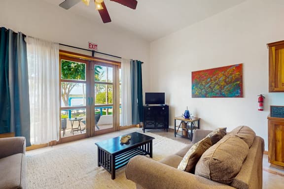 Charming Apartment with Idyllic Waterfront Views and Outdoor Pool Access