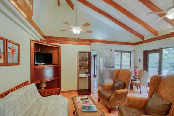 Ocean view condo with shared pool, WiFi, & central AC - steps to beach