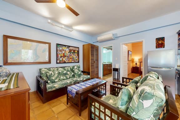 Tranquil ocean-view escape with shared pool, beach access, AC, & free wifi