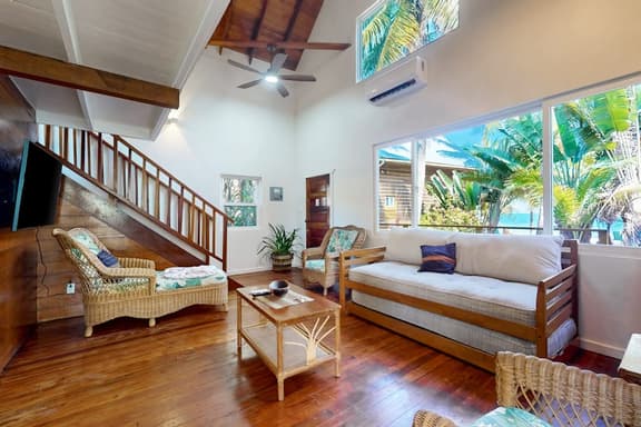 Romantic beachfront home with ocean views, dock, free WiFi, and outdoor dining
