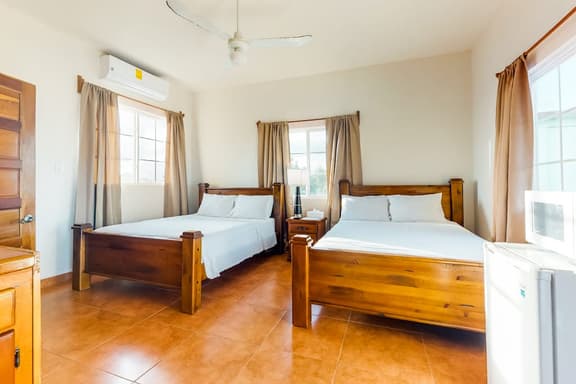 Cozy studio near town with an ocean view, free WiFi, partial AC & shared deck