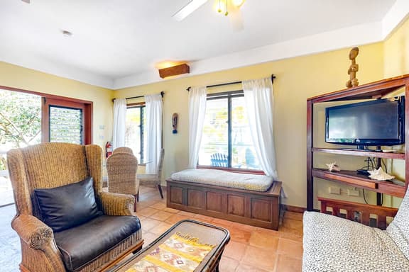 Charming, beachfront condo with shared outdoor pool, central AC, & free WiFi
