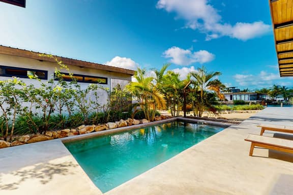Elegant waterfront villa with private pool, terrace and beach club access