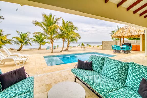 Oceanfront oasis on the beach with private pool, gazebo, grill, patio, and AC