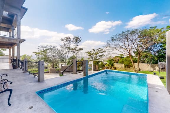 Enchanting home with pool, volleyball, mountain & city views & AC