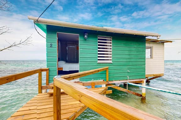Oceanfront cabin w overwater kitchenette, sea views & private deck