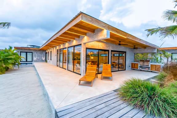 Waterfront villa with splash pool, private terrace, beach access & WiFi
