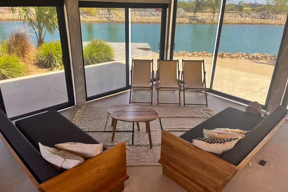 Relaxing tropical villa with private plunge pool, open layout & canal water view