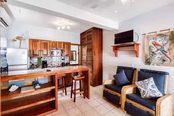 Beachfront dog-friendly condo with pool - walk to ocean from the veranda