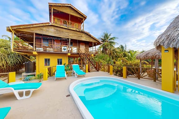 Waterfront villa with private pool, balcony, partial AC, fast WiFi - near beach