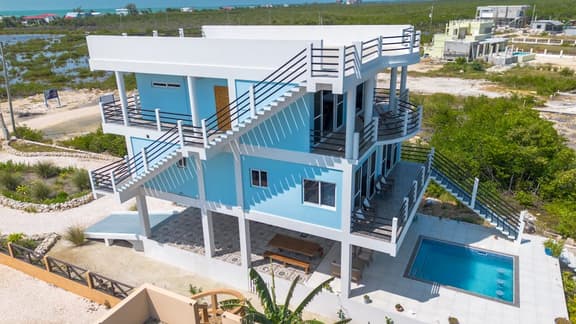 Luxe oceanfront escape with pool, lanais, penthouse suite & ground-floor access